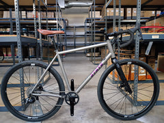 #1588NS – Titanium All-Road | Purple Logo / Drop Bars / Rival eTap / 700x38c (Size Large, Used-Very Good Condition)