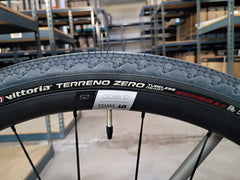 #1588NS – Titanium All-Road | Purple Logo / Drop Bars / Rival eTap / 700x38c (Size Large, Used-Very Good Condition)