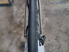 #1588NS – Titanium All-Road | Purple Logo / Drop Bars / Rival eTap / 700x38c (Size Large, Used-Very Good Condition)