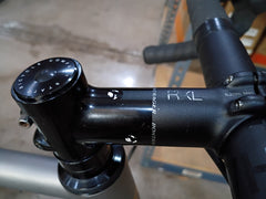 #1588NS – Titanium All-Road | Purple Logo / Drop Bars / Rival eTap / 700x38c (Size Large, Used-Very Good Condition)