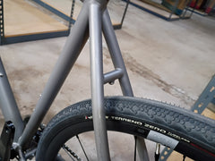 #1588NS – Titanium All-Road | Purple Logo / Drop Bars / Rival eTap / 700x38c (Size Large, Used-Very Good Condition)