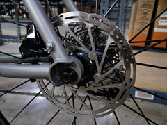 #1588NS – Titanium All-Road | Purple Logo / Drop Bars / Rival eTap / 700x38c (Size Large, Used-Very Good Condition)
