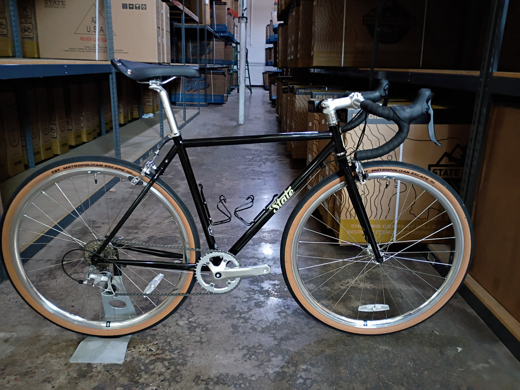 #1671 – 4130 Road V2 / 8-Speed | Black & Tan / Drop Bars / 700c (Size 52cm, Brand New / Open Box + 2 Bottle Cages)