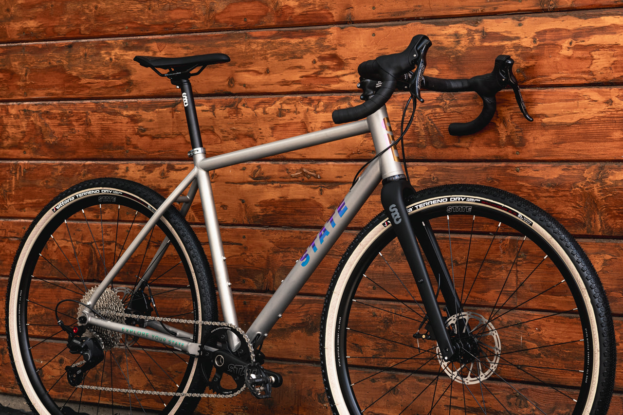 flat bar titanium gravel bike State Bicycle Co. Titanium All-Road - Gravel Bike